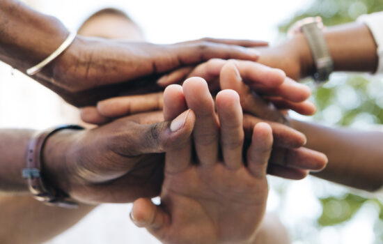 intercultural-hand-shake-outdoor intercultural-hand-shake-outdoor
